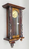 A 19th century Vienna wall clock. 74 cm high.