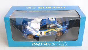 AutoArt 80191 1/18th scale diecast Subaru Impreza WRC Rally Portugal 2001 #5 Burns/Reid, please note