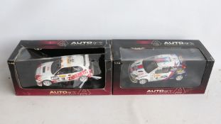 Two 1/18th scale diecast WRC model cars from AutoArt to include 80113 2001 Monte Carlo Rally Ford