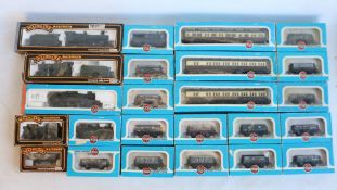 Collection of home weathered OO gauge steam locomotive and rolling stock models from Airfix and