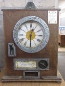 Bryan Twelvewin Clock Penny Slot Arcade Machine, mechanism working at time of cataloguing, 50cm x