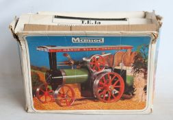 Mamod T.E.1a live steam tractor in fair previously used condition with funnel and steering rod,