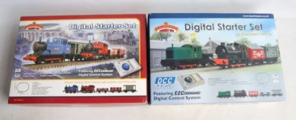 Two OO gauge Digital Starter Sets from Bachmann to include 30-040 and 30-042, both with 2 locos