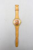 Omega De Ville Dynamic gold plated elliptical case automatic wristwatch with date on later Tissot