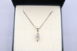 Hallmarked 18ct white gold marquise-cut diamond solitaire pendant, comprising one faceted marquise-
