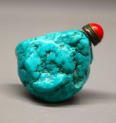Turquoise matrix snuff bottle, irregularly shaped hollowed pebble, with red coral cabochon stopper