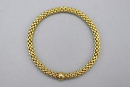 Hallmarked 18ct yellow gold FOPE Flex'it bracelet, comprising an expandable mesh-link design with