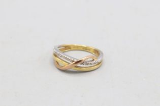 Hallmarked 9ct yellow gold diamond three-tone crossover eternity ring, comprising three interwoven