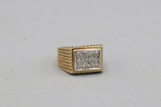 Hallmarked 9ct yellow gold pavé diamond oblong-head signet ring, comprised of a grid of 12 pavé-