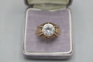 Stamped 18ct yellow gold gypsy-set statement solitaire ring, comprised of one large central round