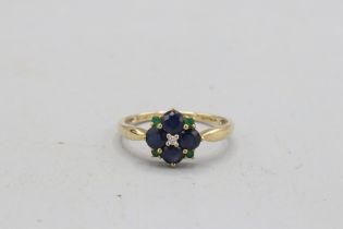 Hallmarked 9ct yellow gold sapphire, emerald and diamond flower head cluster ring, comprised of a