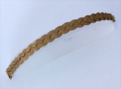 GOLDENES ARMBAND. 750/000 Gelbgold.