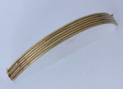 GOLDENES ARMBAND. 750/000 Gelbgold.