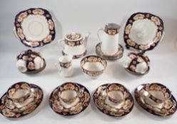 A Royal Albert 1920's tea set comprising teapot with stand, coffee pot, milk jug, sugar, twelve cups