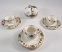 An Aynsley floral part tea set including six cups and saucers, tea plates and milk jug