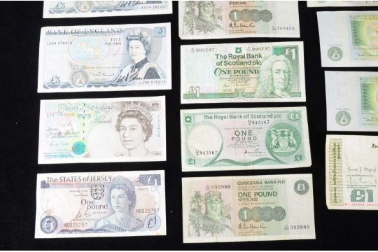 A collection of British Banknotes, including fifteen £1 notes from ...