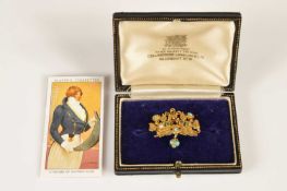 A Regency era gold and gemset acrostic "PEACE" brooch from Watier's Fête of 1814,