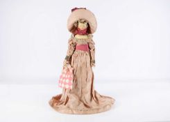 An 19th century Grodnertal wooden doll,