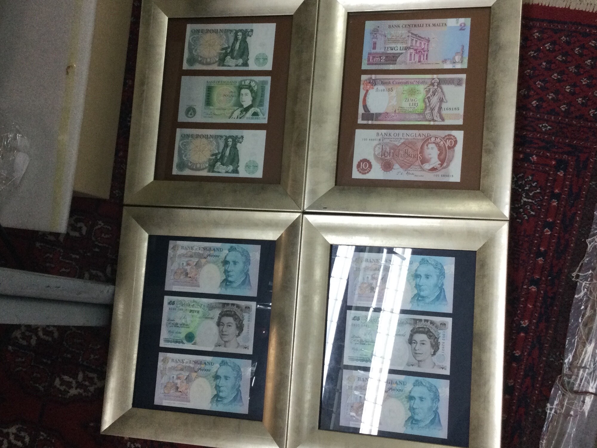 Thirteen framed banknotes