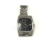 A vintage Omega constellation square face. Black dial. Not seen running.