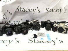 Five vintage SLR cameras, Canon, Minolta, Nikon etc