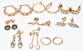 Nine pairs of 9ct gold earrings including diamonds, sapphire and diamond, hoops, etc, 8.1g