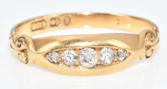 An 18ct gold ring set with five diamonds, Birmingham 1898, 2.6g, size P