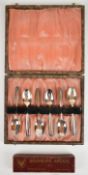 Cased set of six hallmarked silver teaspoons, Birmingham 1930, maker's mark TS, together with a