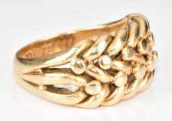 An 18ct gold keeper ring, Chester 1909, 10g, size L