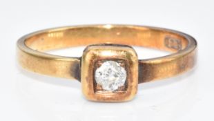 An 18ct gold ring set with an old cut diamond of approximately 0.14ct, size N