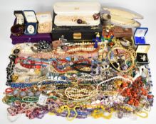 A collection of jewellery including three silver rings, 9ct and silver ring, vintage necklaces,