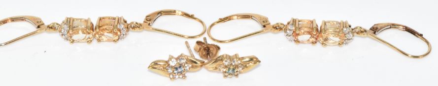 Three pairs of 9ct gold earrings, one topaz and two pairs imperial topaz and diamonds, with