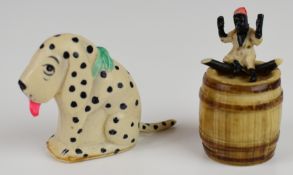 Two novelty vintage celluloid figural retractable tape measures including Dismal Desmond The