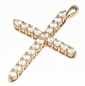 A 9ct gold cross pendant set with cubic zirconia, 7g, 5cm