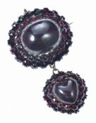 Victorian brooch set with Bohemian cut garnets, an oval garnet cabochon and a heart shaped garnet