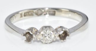 An 18ct gold ring set with a diamond (two stones missing), 2.3g, size K