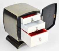 Mid century modern musical jewellery box with hinged door and three drawers, height 14cm
