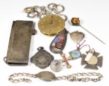 A collection of silver including two fobs, identity bracelet, nine Victorian bolt claps, butterfly