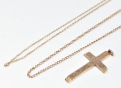Two 9ct gold chains and a cross with engraved scrolling decoration, 5.8g, 46 & 36cm