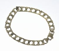 A 9ct gold textured curb link bracelet, 13.7g, 20cm