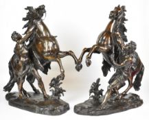 After Guillaume Coustou (French 1677-1746) pair of patinated bronze Marley horses, with impressed