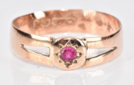 A 9ct rose gold ring set with a round cut spinel in a star setting, Birmingham 1897, 2g, size U