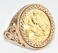 A 9ct gold ring set with a 1982 gold half sovereign, 8.3g, size Q