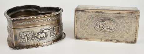 Indian or similar silver trinket box with space for pin cushion lid, the edge having embossed scenes