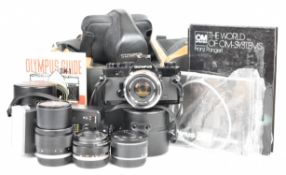 Olympus OM-1 35mm SLR camera outfit with Zuiko  1:3.5 f=28mm, 1:1.8 f=50mm and 1:3.5 f=135mm lenses,