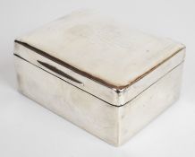 George V hallmarked silver cigarette box with presentation to lid 'to Lieut R.E.M. Harris Royal