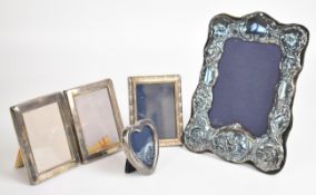 Five modern hallmarked silver photograph frames, the largest to suit 5.5 x 4 inch photo and