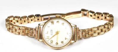 Tissot 9ct gold ladies wristwatch with gold hands and Arabic numerals, silver dial and signed 15