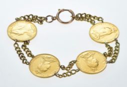 A yellow metal bracelet set with four gold full sovereigns comprising 1894, 1888, 1889 & 1890, 41.
