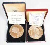 Two Royal Mint 925/1000 silver coins, 150g each, Falklands issues to commemorate 1986 Royal